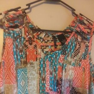 Sleeveless Top with Cut Out Accents